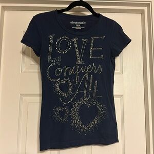 Love Conquers All Tee